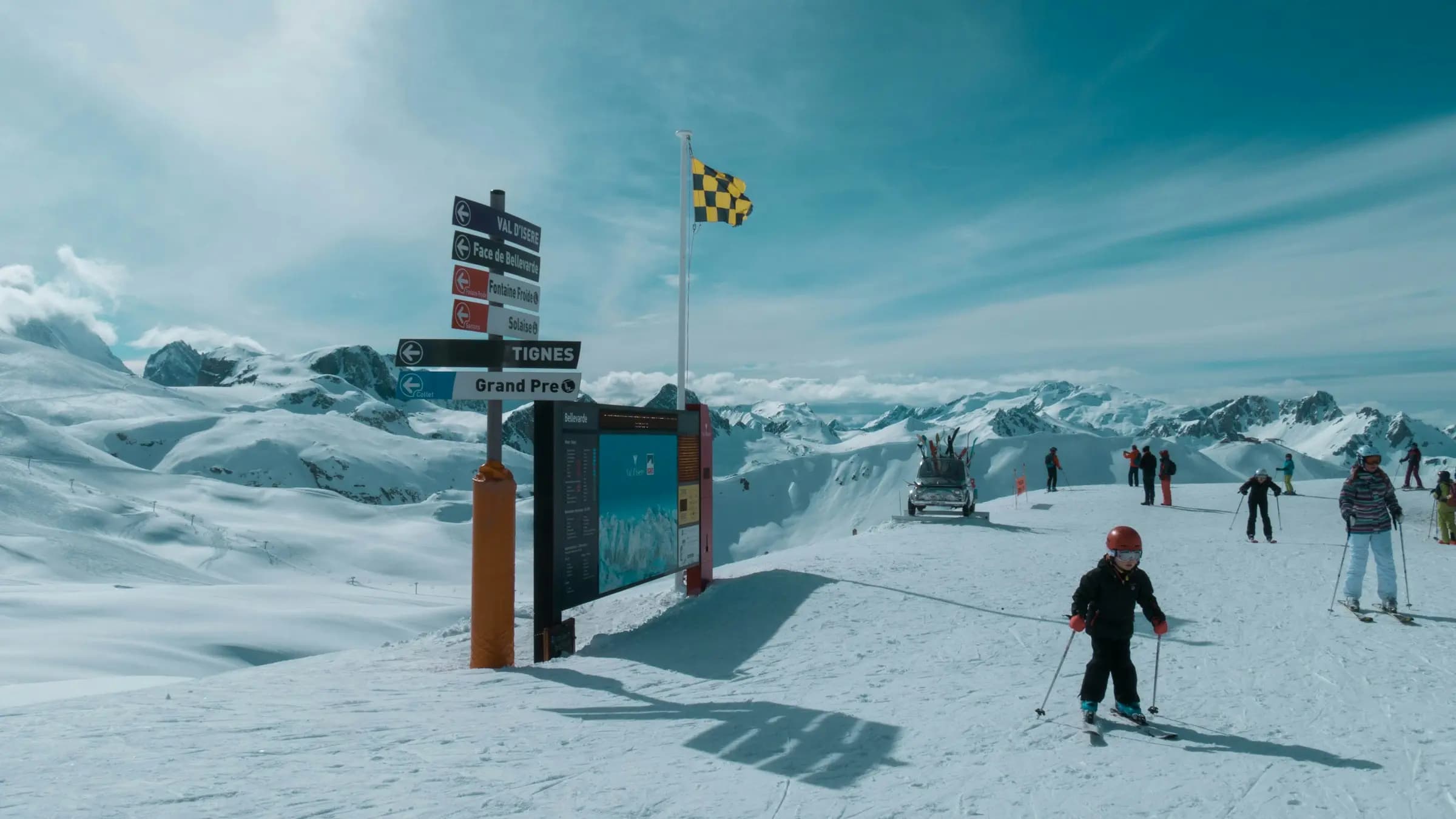 people walking on snow covered ground during daytime