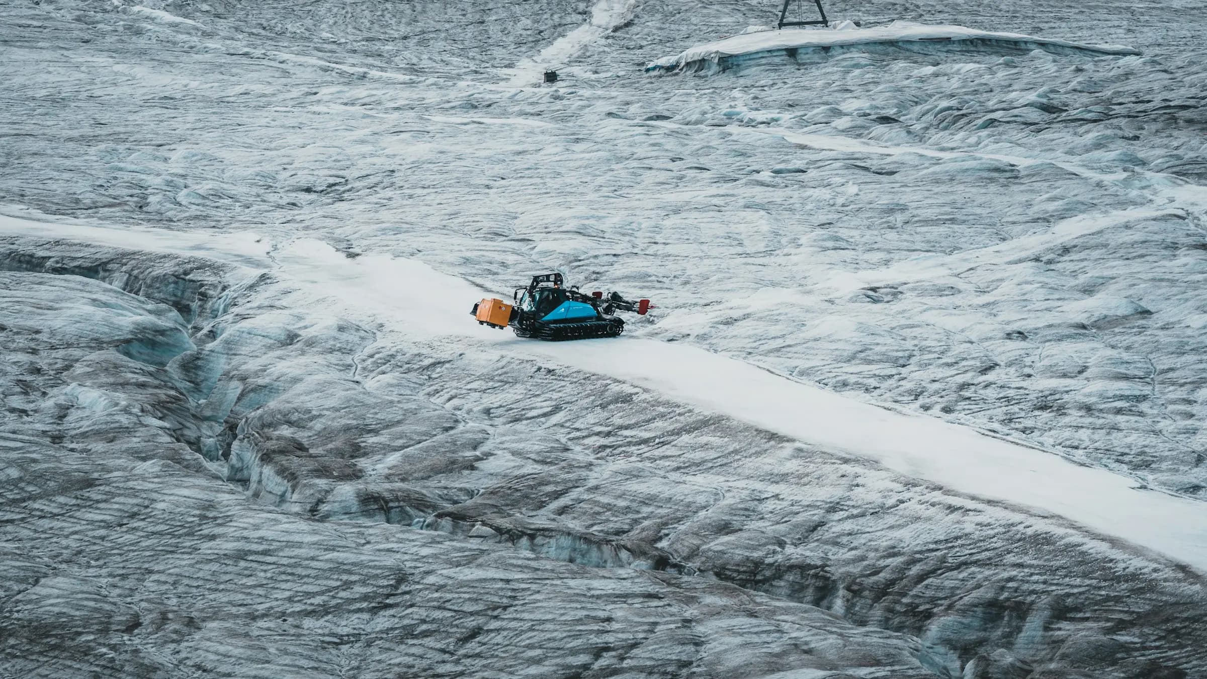 a car driving on a snowy road