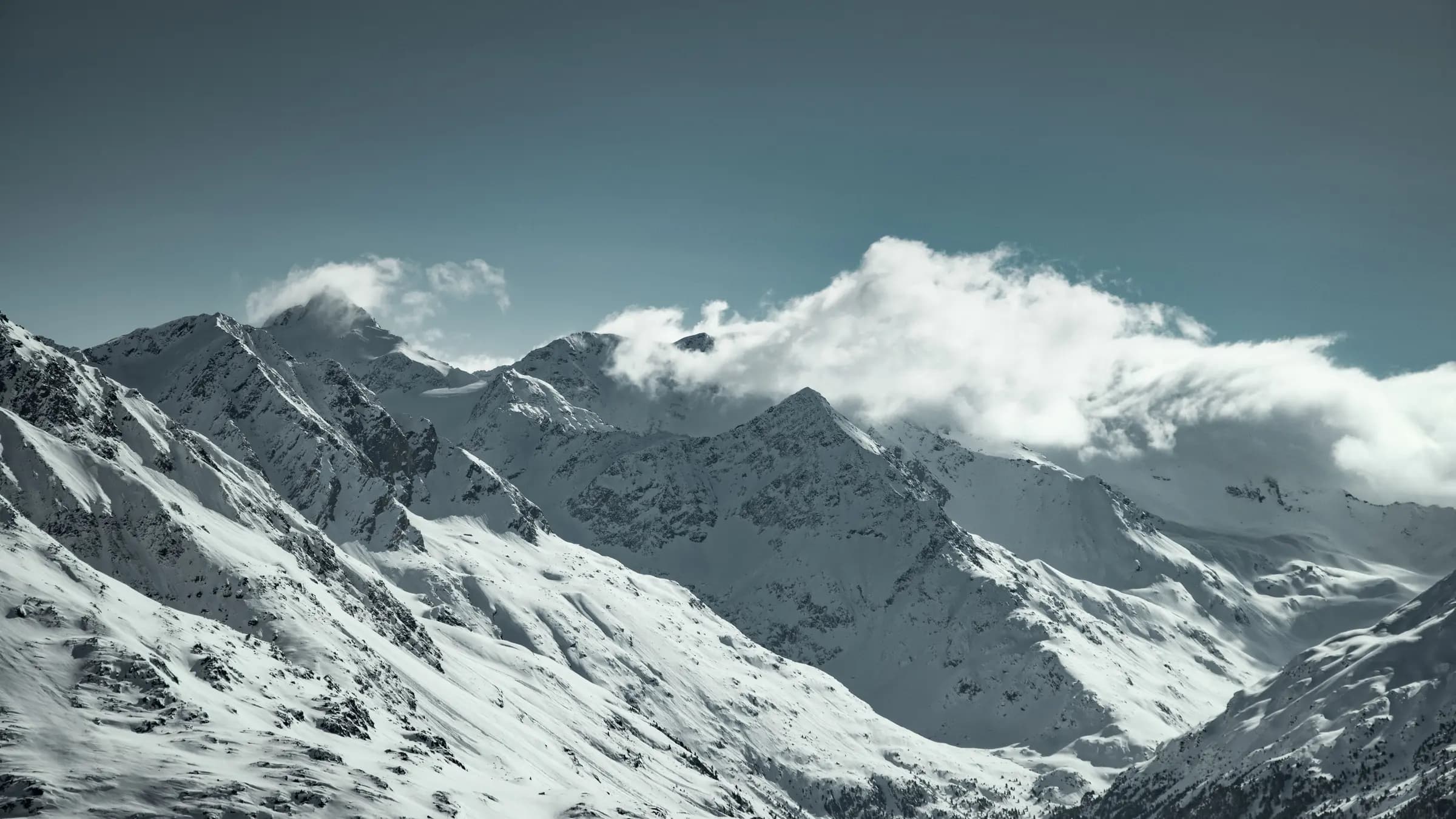A breathtaking view of snow-covered mountains in Sölden, Tirol, Austria.